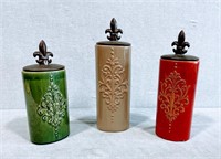 3 Multi-colored canisters w/ tops