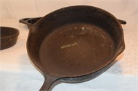 8" Wagner cast iron pan and Lodge cornbread pan.