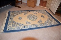 100% wool pile handmade in India floor rug.