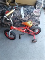 SMALL BICYCLE WITH TRAINING WHEELS HAS  FLAT TIRES