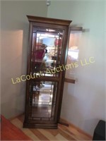 beautiful beveled glass lighted curio cabinet