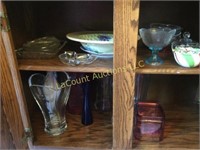 all on 2 shelves vases bowls covered candy