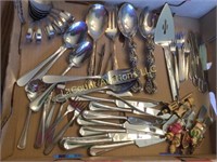 many assorted serving utensils spoons forks