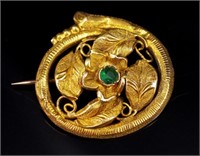 Colonial yellow gold brooch