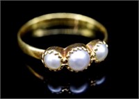 Antique three stone pearl and yellow gold ring