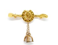 Antique yellow gold horse and shoe brooch