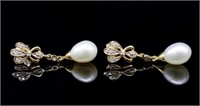 Diamond & pearl set 14ct yellow gold drop