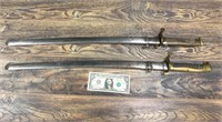 Pair of Japanese WWII issue police swords with bra
