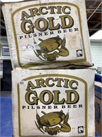 2 boxes of Arctic Gold Pilsner beer bottles still