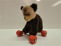 Vintage Knickerbocker bear with wheels pull toy