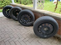 Set of 4 snow tires on steel rims- 235/50R18-O