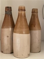 3 Crock bottles - 1 marked