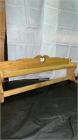 Wall shelf with clothing hanger