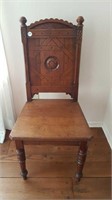 ANTIQUE WOOD CHAIR WITH CARVED BACK