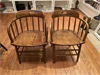 Two heavy oak barrel back chairs w/metal support