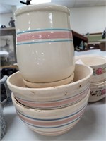 Nesting pottery bowls and crock