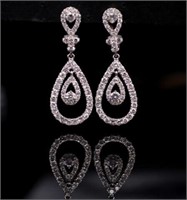 Diamond and 18ct white gold swinging drop earrings