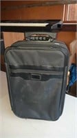 Small suitcase with wheels and pull handle 9