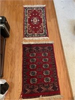 Two small rugs