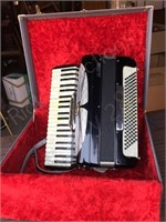 L A Cordia adult size accordion in case