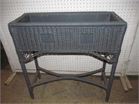 Antique wicker planter