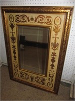 Bevelled mirror w. decorated frame