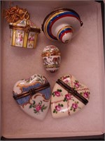 Four miniature decorated china boxes: