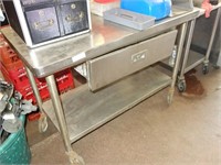 Stainless table with drawer and stainless under sh