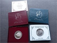 2 George Washington silver half dollars
