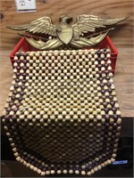 Metal eagle wall hanger, wood bead seat cushion
