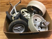 Box lot of training wheels and miscellaneous
