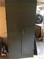 Metal storage cabinet with 3 extra shelves