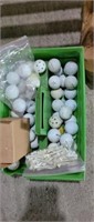 Group of golf balls and tees