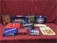 Box of assorted board games such as Scrabble,