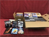 2 boxes of Disney and other movies with titles