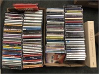2 boxes of CDs of assorted rock CDs