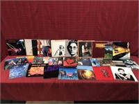 Assortment of records with artists such as Bruce