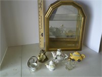 small tea pots with showcase