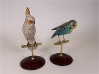 2 wooden bird figurines