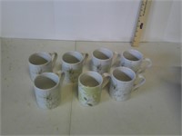 set of coffee cups all match except one