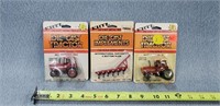 2-1/64 IH Tractors and Plow