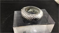 Silver fashion bracelet with crushed metal look