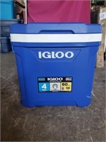 IGLOO cooler on rollers 60 quarts can hold 94