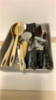 Can opener, spoons and various Kitchen utensils