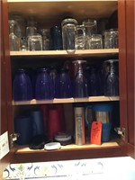 cabinet of cups, stemware, mugs, etc.