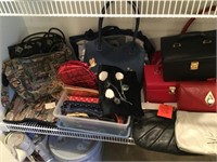 shelf of purses, wallets, travel bags, etc.