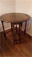 DROP LEAF GATE LEG TABLE WITH CARVED TOP