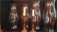 4 LARGE GLASS CHIMNEYS+ PAIR OF BRASS CANDLESTICKS