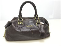 Coach dark brown distressed leather clip end