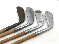 Four Vintage Wood Shaft Golf Clubs. May Malone,